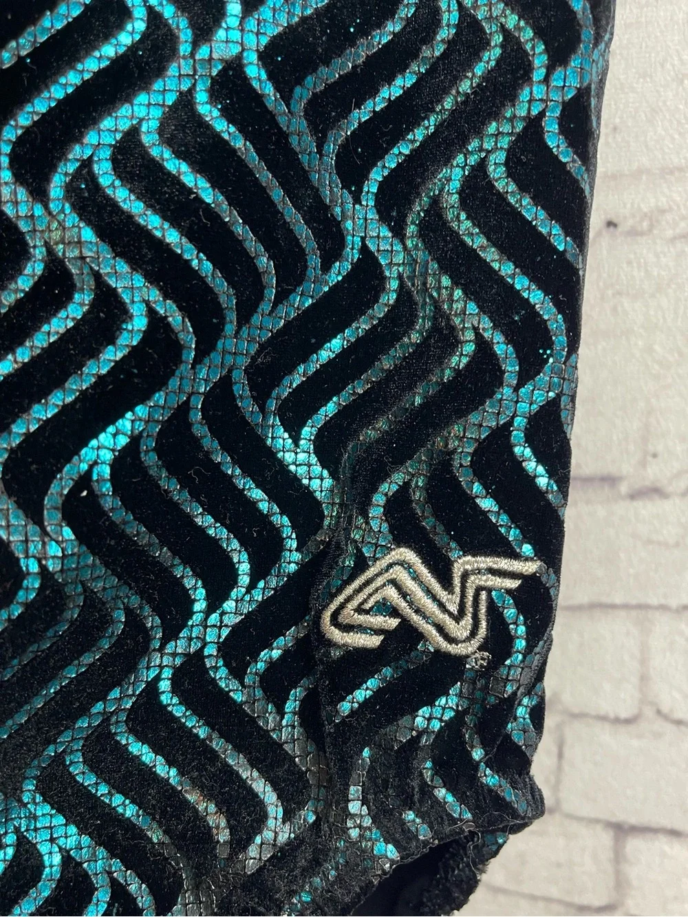 Alpha Factor size child’s large black and turquoise leotard